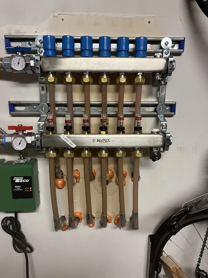 Plumber performing Gas Leak Detection at a residential property in Withamsville